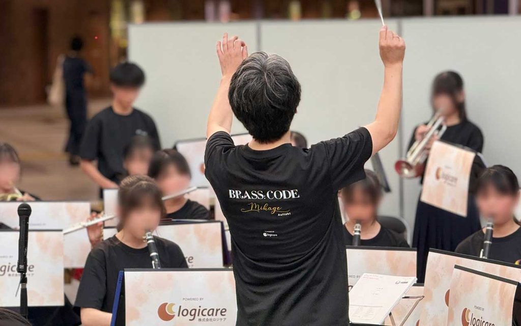 タクトを振る識者